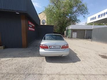 нексия рестайлинг: Седан серебристого цвета, 4 двери, просторный салон, черная тканевая — 6