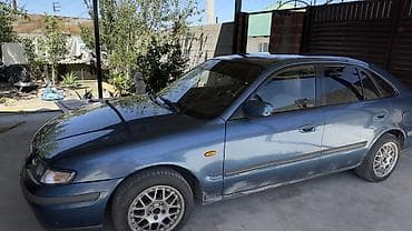 Mazda: Mazda 626: 1997 г., 1.8 л, Механика, Газ, Седан — 10