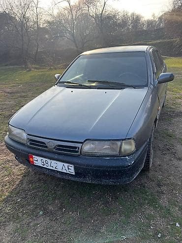 тез арада: Nissan Primera: 1991 г., 1.6 л, Кол менен иштөөчү, Бензин, Седан — 4