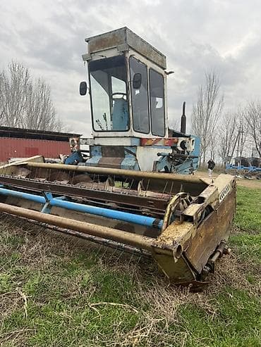 задний редуктор: Самоходная косилка-валкоукладчик - Ширина захвата жатки: около 3–4 м — 1
