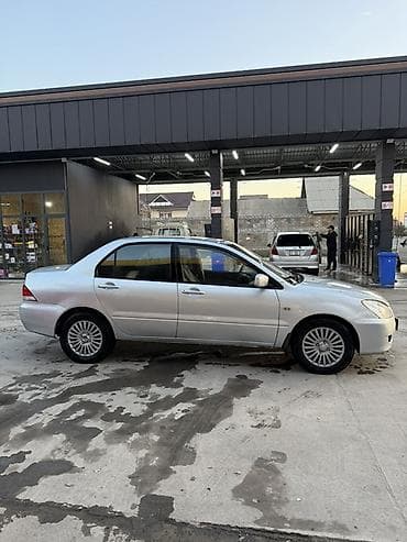лада веста крос: Mitsubishi Lancer: 2004 г., 2 л, Автомат, Бензин, Седан — 4