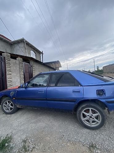 Mazda 323: 2026 г., Механика, Бензин, Хэтчбэк