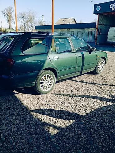 dio 27: Nissan Primera: 1999 г., 1.8 л, Универсал — 4
