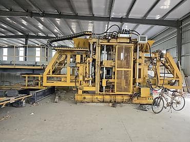 поддоны: Линия по производству бетонных блоков BESSER Промышленный вибропресс — 3