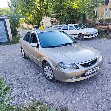 бутка бу: Mazda Familia: 2002 г., 1.6 л, Автомат, Бензин, Седан — 1