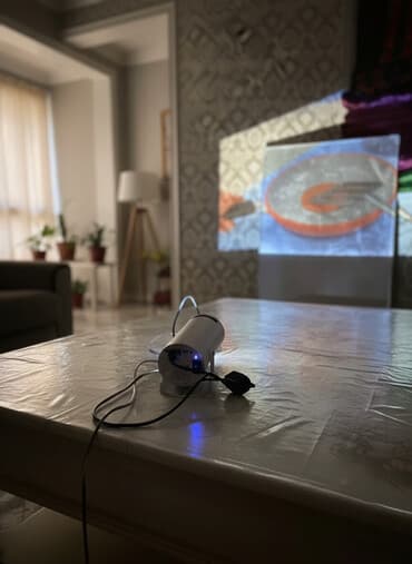 трейд ин телефон бишкек: Компактный портативный проектор с пультом ДУ. Особенности: - — 1