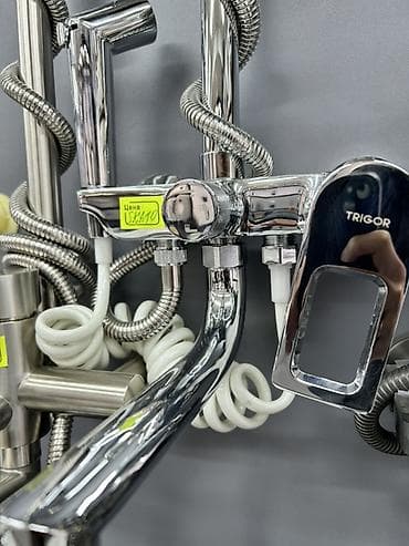 Гигиенический душ: Смеситель для умывальника/ванны TRIGOR с гигиеническим душем. - — 1