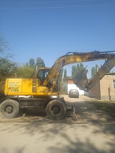 Экскаватор, Komatsu, 2010 г., Колесный