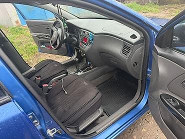 кызыл кия кыз: Kia Rio: 2011 г., 1.4 л, Автомат, Бензин, Седан — 7