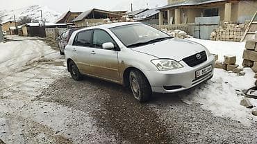 Toyota Corolla: 2003 г., 1.4 л, Механика, Бензин, Седан