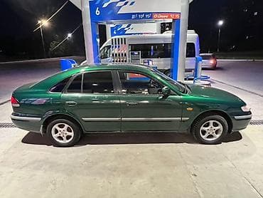 34 bwm: Mazda 626: 1998 г., 1.8 л, Механика, Бензин, Седан — 2