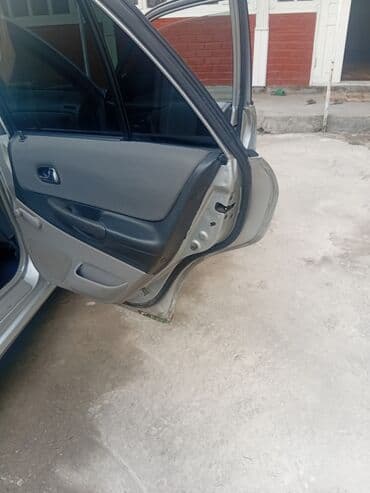 автомобиль бу: Mazda 323: 2003 г., 1.3 л, Механика, Бензин, Хетчбек — 8