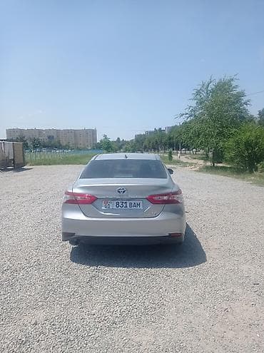 camry hibrid: Toyota Camry Hybrid, серебристый седан. Основные особенности: - — 6