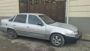 опель корса б: Daewoo Nexia: 1996 г., Механика, Бензин, Седан — 4