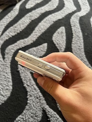 nokia e7: Genius G-shot D-613 компактная камера на мизинчиковых батарейках. С — 2