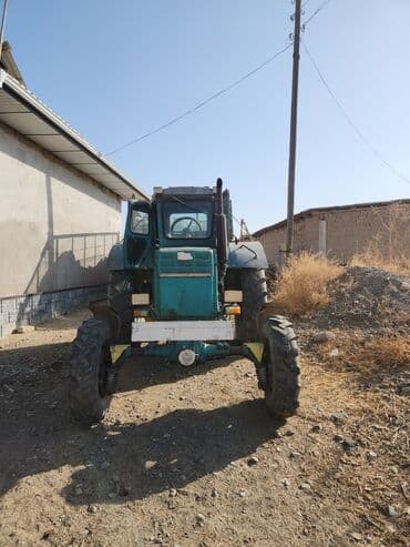 Трактор колёсный, класс тяги 1,4–2,0 (тип МТЗ/ЮМЗ). Кабина остеклённая
