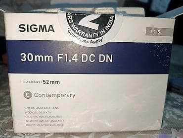 материал на чехол: Объектив Sigma 30mm f/1.4 DC DN (диаметр фильтра 52 мм) - Фокусное — 6