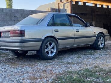 Mazda 626: 1990 г., 1.8 л, Механика, Бензин, Седан