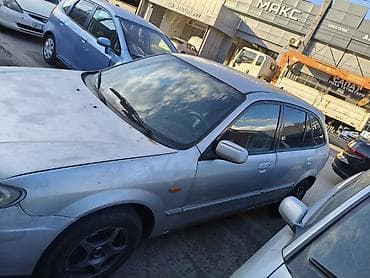 mini kooper: Mazda Familia: 2002 г., Механика, Бензин, Универсал — 5