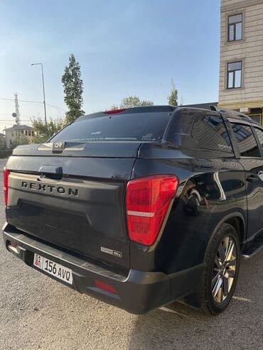 rex: Черный (рамный) внедорожник Rexton 2019г. 2.2 турбо дизель. Камеры — 9