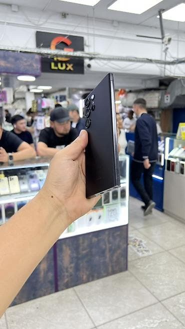 чипс: Samsung Galaxy S23 Ultra, Б/у, 256 ГБ, цвет - Черный, 1 SIM, eSIM — 5