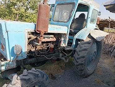 трактор т70: Трактор колесный, с кабиной, голубого цвета. Характеристики и — 8