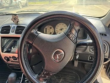 степ вагон спада 2003: Mazda Familia: 2002 г., 1.5 л, Автомат, Бензин, Универсал — 7