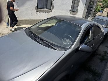 задний лабовой: Nissan Primera: 2002 г., 2 л, Механика, Газ, Хэтчбэк — 4