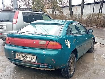 капот мазда 323: Mazda 323: 1995 г., Хэтчбэк — 3