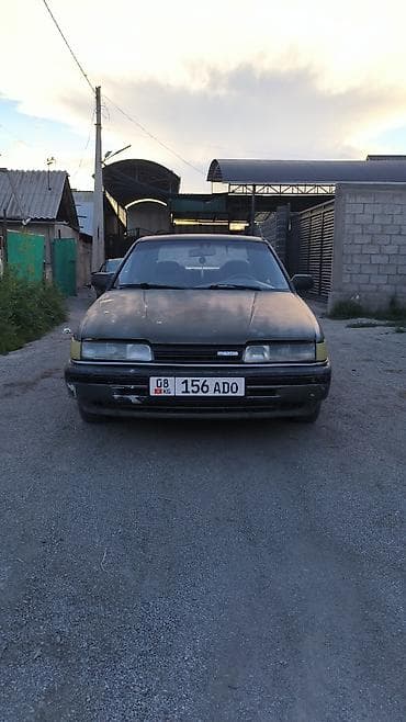 Унаа: Mazda 626: 1989 г., 2 л, Кол менен иштөөчү, Бензин, Седан — 1