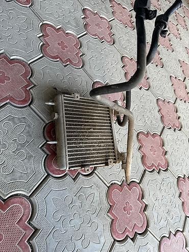 Радиатор охлаждения коробки Mercedes 210-й м119