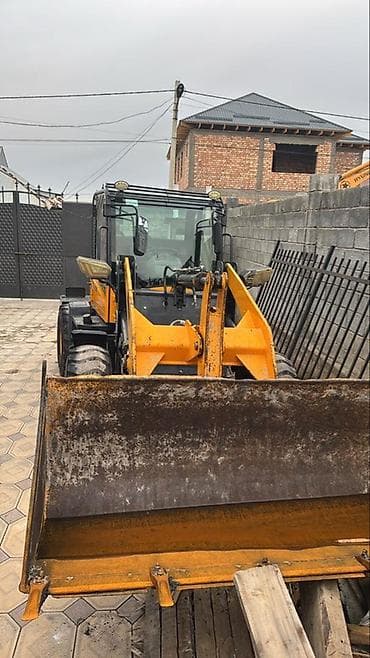 m5 e60: Погрузчик, Колесный, Фронтальный — 2