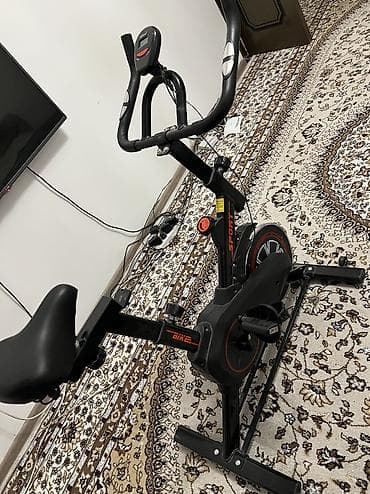 Велосипед тетиктери: Велотренажер Регулировка сидения Регулировка скорости Счетчик: время — 1