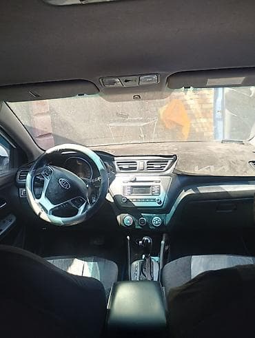 салон б4: Kia Rio: 2015 г., 1.6 л, Автомат, Бензин, Седан — 3