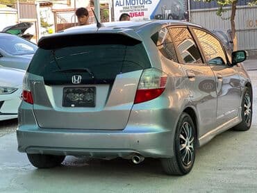 corolla runx: Honda Fit: 2010 г., 1.5 л, Механика, Газ, Хэтчбэк — 10