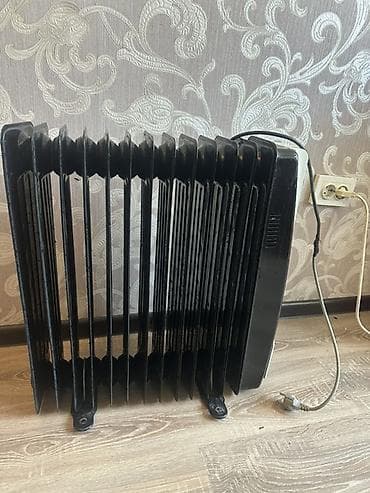 конвектор: Масляный обогреватель Кол-во секций: 10 и более, Несколько режимов мощности — 4