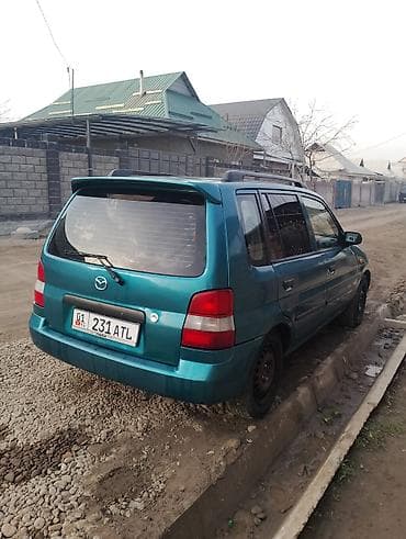deu labo: Mazda Demio: 1999 г., 1.3 л, Механика, Бензин, Минивэн — 5