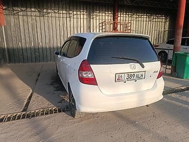 porter 1: Honda Fit: 2003 г., 1.3 л, Вариатор, Бензин, Хэтчбэк — 2