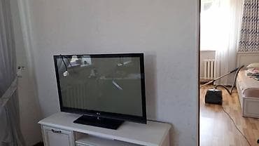 аксессуары для смарт тв: Телевизор LG, диагональ около 40–42". Плоская панель, тонкий корпус — 1