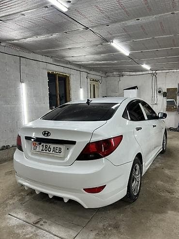 bid e5: Hyundai Solaris: 2012 г., 1.6 л, Ручные, Бензин, Седан — 4
