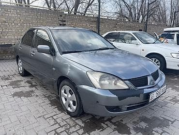 мицубиши лансер: Mitsubishi Lancer: 2005 г., 1.6 л, Автомат, Бензин, Седан — 9