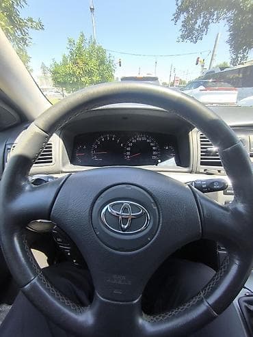 Унаа: Toyota Corolla: 2003 г., 1.6 л, Кол менен иштөөчү, Бензин, Универсал — 6