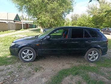 моторчик печки 124: Mazda 323: 2001 г., 2 л, Механика, Бензин, Хэтчбэк — 10