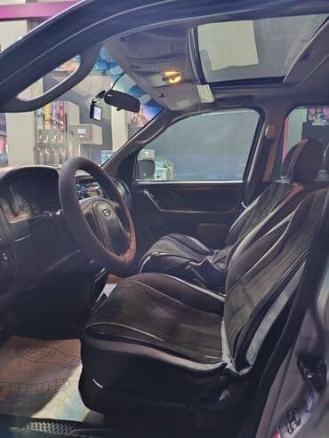 срочно продаю в связи с переездом: Ford Maverick: 2003 г., 2 л, Механика, Бензин, Кроссовер — 11