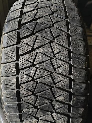 покрышки на квадроцикл: Шины 275 / 45 / R 20, Зима, Б/у, 1 шт, Внедорожные (АТ/МТ), Япония, Bridgestone — 2