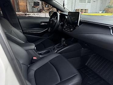 тае: Toyota Corolla: 2019 г., 1.8 л, Вариатор, Гибрид, Седан — 7