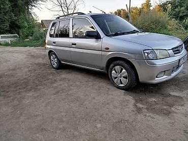 byd e2 2022: Mazda Demio: 2002 г., Механика, Бензин, Универсал — 8