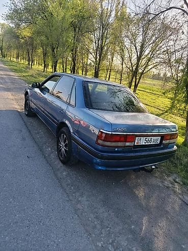 Mazda 626: 1990 г., 1.8 л, Механика, Бензин, Седан