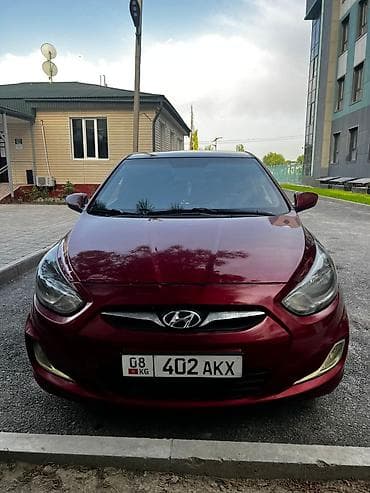 nisan march: Hyundai Solaris: 2011 г., 1.6 л, Автомат, Хэтчбэк — 2