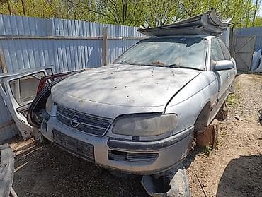катуша: Opel Omega B, серебристый седан — разбор по запчастям Доступны — 3